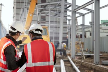 Contractors at a Construction Site in Queens, NY with Builders Risk Insurance